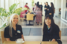 Gail Zermeno (volunteer) and Leslie Gray (Exec. Dir.) welcome guests to the reception